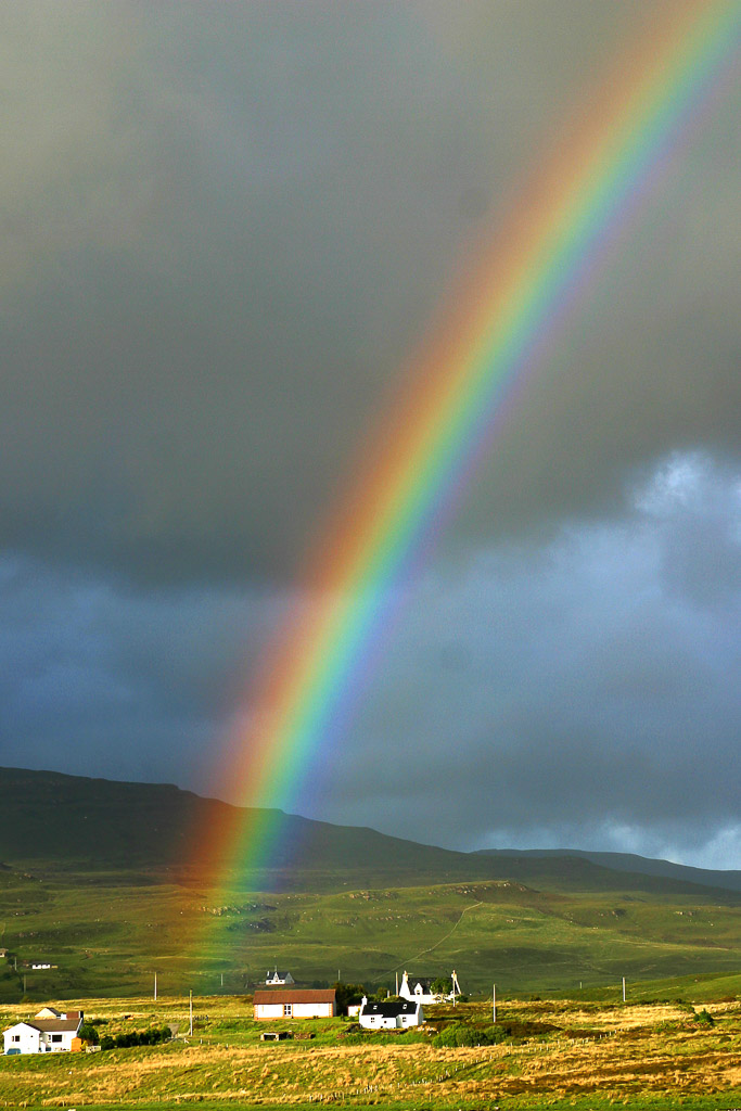 While the frequent rain on the Isle of Skye can be annoying, it also provides lots of occasions to catch beautiful sights of the rainbows which are produced by the rare sunshine spots.